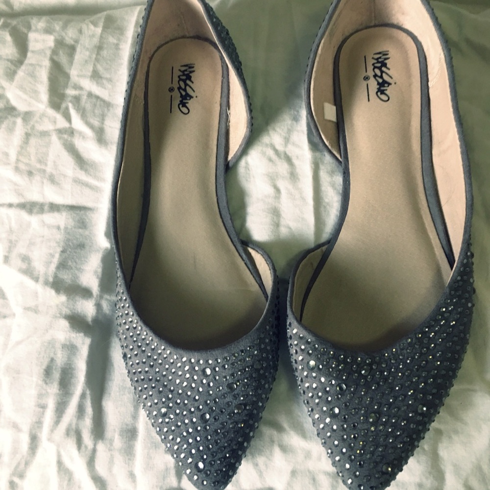 Gray bejeweled flats.